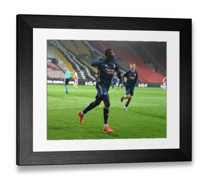Framed Print : Nicolas Pepe Scores First Arsenal Goal in Europa League Victory over Slavia Praha (Behind Closed Doors) Framed Print : Nicolas Pepe Scores First Arsenal Goal in Europa League Victory over Slavia Praha (Behind Closed Doors)