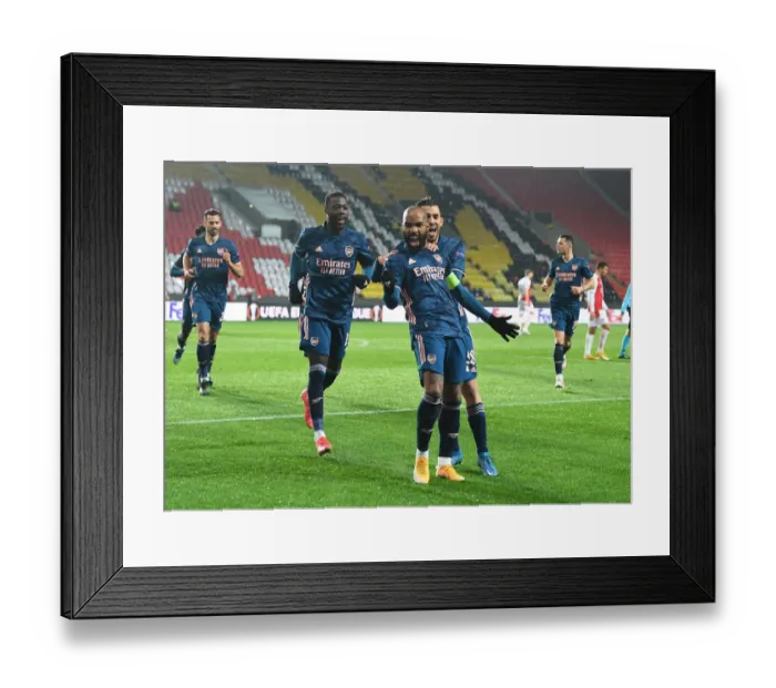 Framed Print : Arsenal's Alexis Lacazette, Dani Ceballos, and Nicolas Pepe Celebrate Goals in Empty Eden Arena during Slavia Prague vs Arsenal UEFA Europa League Quarterfinal