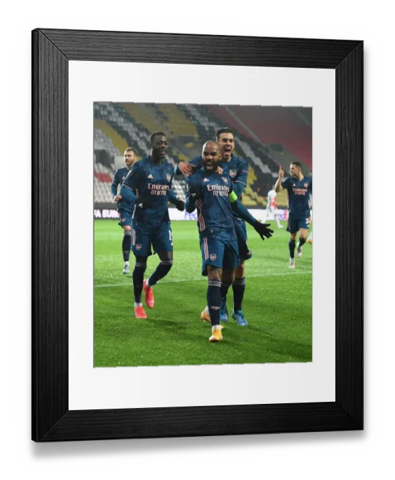 Framed Print : Arsenal's Alexis Lacazette Scores in Europa League Quarterfinal Against Slavia Praha Amidst Empty Stands Framed Print : Arsenal's Alexis Lacazette Scores in Europa League Quarterfinal Against Slavia Praha Amidst Empty Stands