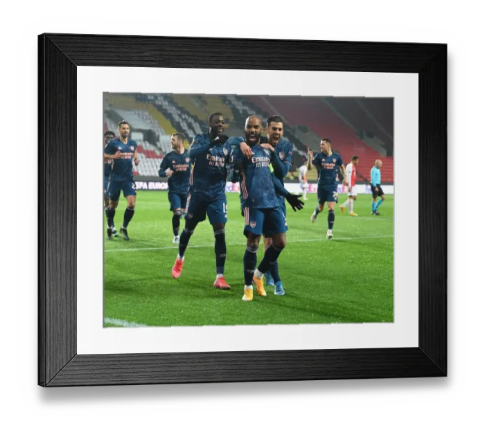 Framed Print : Arsenal's Alex Lacazette Scores in Europa League Quarterfinal against Slavia Praha in Prague