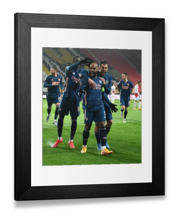 Framed Print : Alexis Lacazette Scores in Empty Eden Arena: Arsenal's Europa League Victory Over Slavia Praha