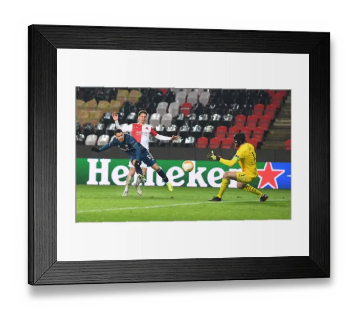 Framed Print : Arsenal's Martinelli Shoots Wide in Empty Eden Arena: Slavia Prague vs Arsenal, UEFA Europa League Quarterfinal