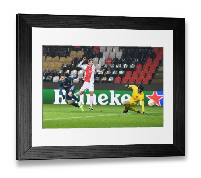 Framed Print : Arsenal's Martinelli Misses Wide in Empty Eden Arena: Slavia Prague vs Arsenal, UEFA Europa League Quarterfinal Framed Print : Arsenal's Martinelli Misses Wide in Empty Eden Arena: Slavia Prague vs Arsenal, UEFA Europa League Quarterfinal