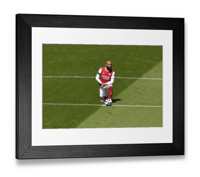 Framed Print : Arsenal's Alexis Lacazette Takes a Knee at Empty Emirates Stadium: Arsenal v Fulham, Premier League 2020-21