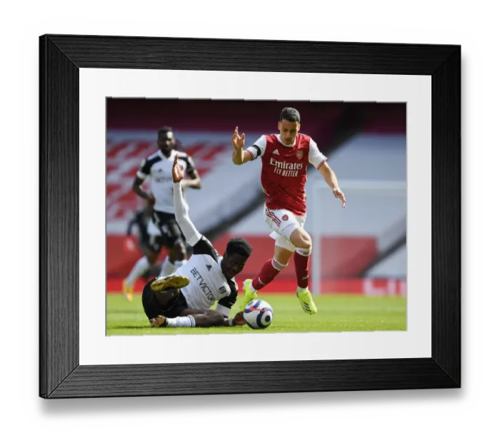 Framed Print : Arsenal's Martinelli Clashes with Fulham's Aina in Empty Emirates Stadium, April 2021 Framed Print : Arsenal's Martinelli Clashes with Fulham's Aina in Empty Emirates Stadium, April 2021