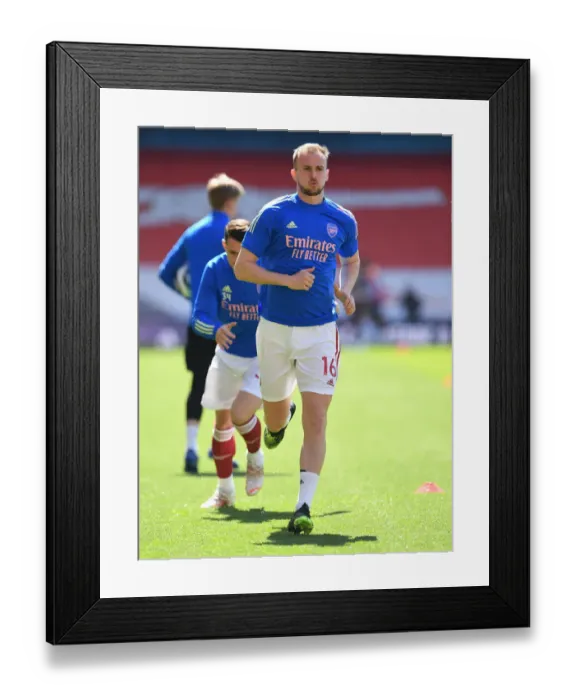 Framed Print : Arsenal's Rob Holding: Pre-Match Focus at Empty Emirates Stadium During Arsenal v Fulham, Premier League 2020-21 Framed Print : Arsenal's Rob Holding: Pre-Match Focus at Empty Emirates Stadium During Arsenal v Fulham, Premier League 2020-21