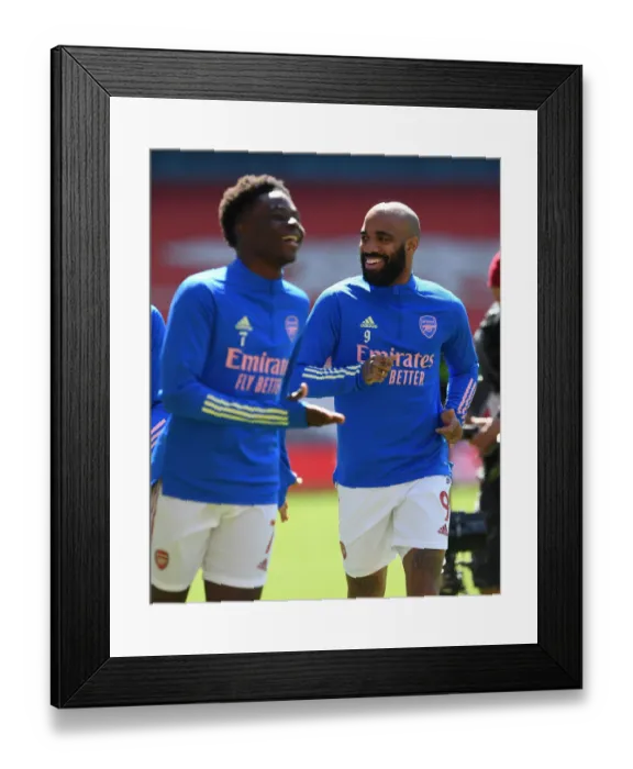 Framed Print : Alexandre Lacazette Prepares for Empty Emirates Clash: Arsenal vs. Fulham (2021-22 Premier League) Framed Print : Alexandre Lacazette Prepares for Empty Emirates Clash: Arsenal vs. Fulham (2021-22 Premier League)