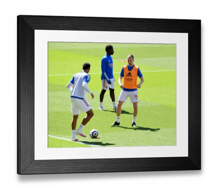 Framed Print : Arsenal's Rob Holding: Pre-Match Focus at Empty Emirates Stadium (2021 Premier League: Arsenal vs. Fulham) Framed Print : Arsenal's Rob Holding: Pre-Match Focus at Empty Emirates Stadium (2021 Premier League: Arsenal vs. Fulham)