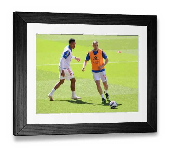 Framed Print : Arsenal's Holding and Magalhaes in Action: Arsenal v Fulham, Emirates Stadium (Behind Closed Doors), April 2021