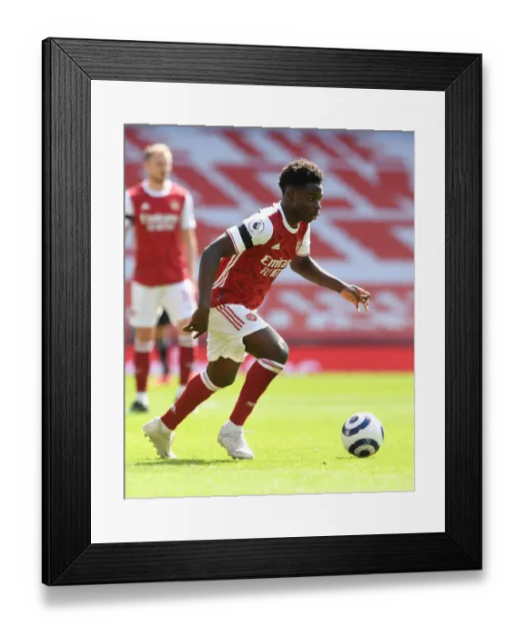 Framed Print : Arsenal's Bukayo Saka Shines at Empty Emirates Against Fulham (2020-21)
