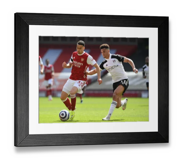 Framed Print : Arsenal's Martinelli Clashes with Fulham's Robinson in Empty Emirates Stadium, Premier League 2020-21