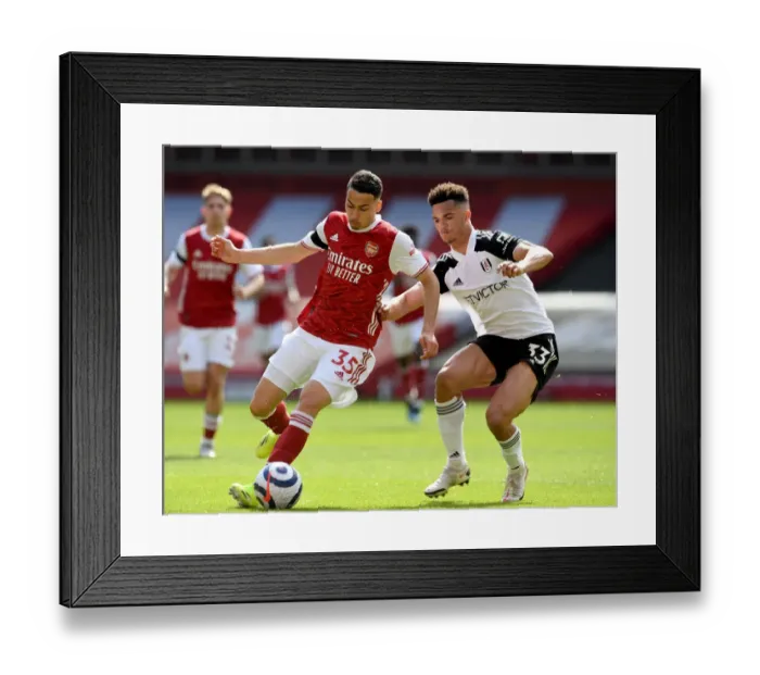 Framed Print : Martinelli vs. Robinson: A Rivalry Unfolds in Empty Emirates Stadium - Arsenal vs. Fulham, Premier League 2020-21