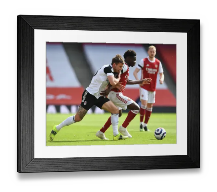 Framed Print : Arsenal's Bukayo Saka Faces Off Against Fulham's Joe Bryan in Empty Emirates Stadium, Premier League 2020-21 Framed Print : Arsenal's Bukayo Saka Faces Off Against Fulham's Joe Bryan in Empty Emirates Stadium, Premier League 2020-21