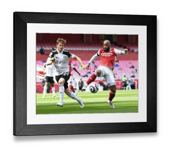 Framed Print : Arsenal vs Fulham: Lacazette Faces Off Against Andersen in Empty Emirates Stadium, Premier League 2020-21