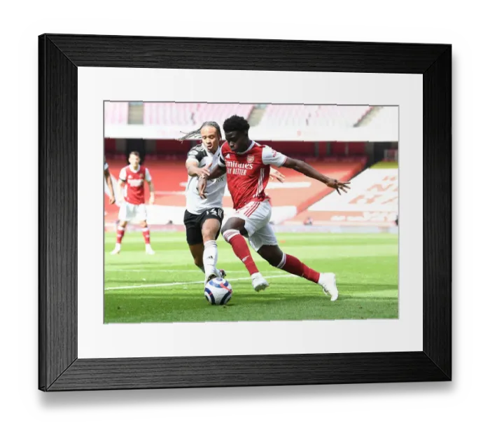 Framed Print : Arsenal's Bukayo Saka Faces Off Against Fulham's Bobby De Cordova-Reid in Empty Emirates Stadium, Premier League 2020-21 Framed Print : Arsenal's Bukayo Saka Faces Off Against Fulham's Bobby De Cordova-Reid in Empty Emirates Stadium, Premier League 2020-21