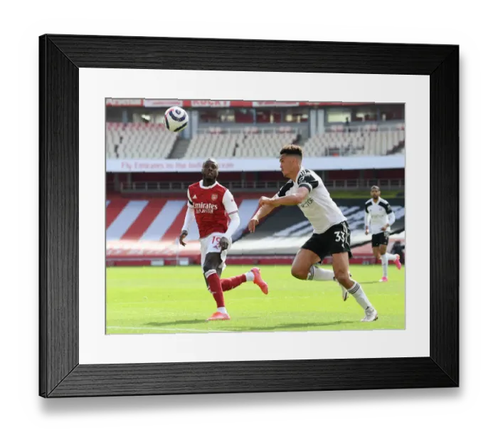 Framed Print : Arsenal vs Fulham: Pepe Faces Pressure in Empty Emirates Stadium, Premier League 2020-21