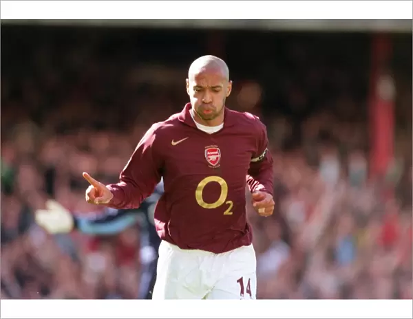 Thierry Henry celebrates scoring Arsenals 2nd goal his 1st