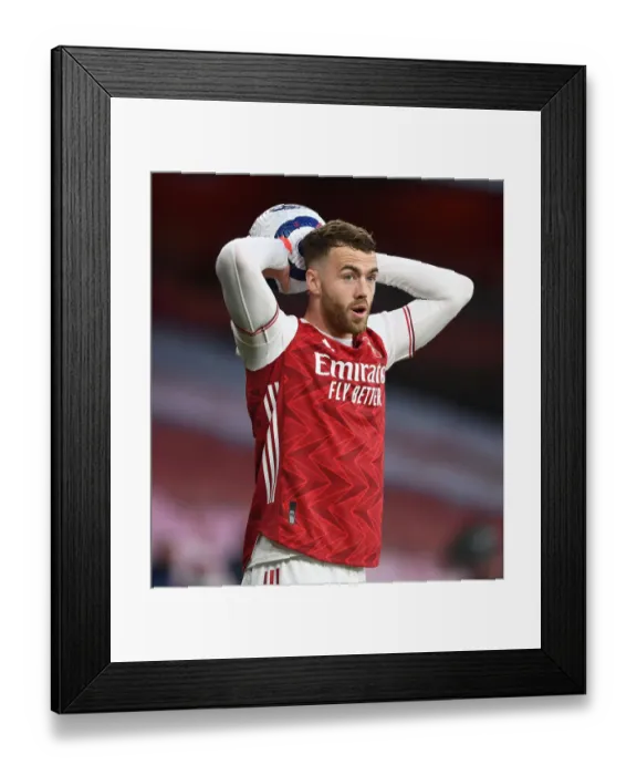 Framed Print : Arsenal's Calum Chambers in Action against Everton: Emirates Stadium Showdown Amidst Pandemic Restrictions (Arsenal v Everton, 2021)