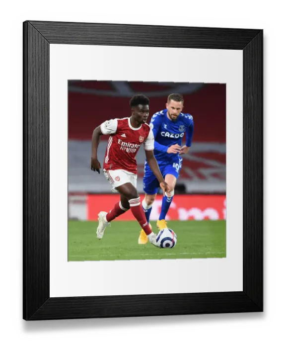Framed Print : Arsenal's Bukayo Saka in Action Against Everton at Emptied Emirates Stadium, Premier League 2020-21
