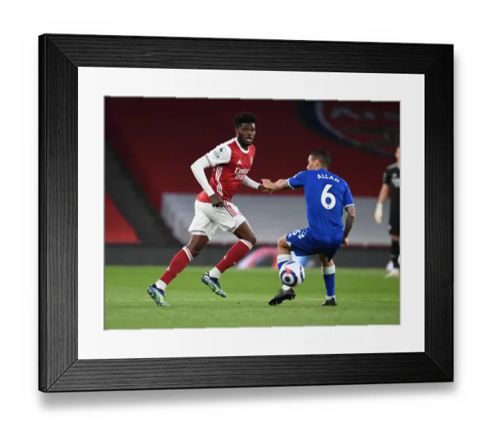 Framed Print : Thomas Partey vs. Allan: Arsenal vs. Everton, Premier League Clash Amidst Empty Stands (April 2021) Framed Print : Thomas Partey vs. Allan: Arsenal vs. Everton, Premier League Clash Amidst Empty Stands (April 2021)