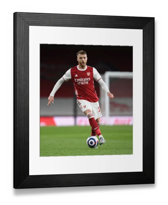 Framed Print : Arsenal's Calum Chambers at Empty Emirates Stadium: Arsenal vs. Everton, 2021 Framed Print : Arsenal's Calum Chambers at Empty Emirates Stadium: Arsenal vs. Everton, 2021