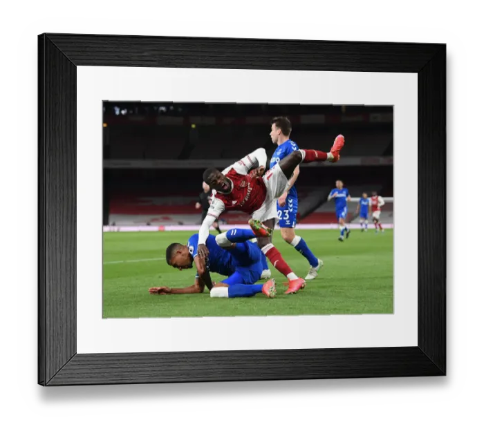Framed Print : Pepe vs. Holgate: Foul Play at Empty Emirates - Arsenal vs. Everton, Premier League 2020-21