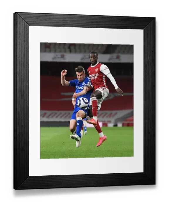 Framed Print : Pepe vs Coleman: A Premier League Showdown at Empty Emirates - Arsenal vs Everton (2020-21)