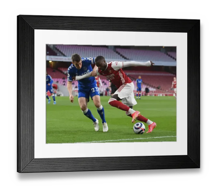 Framed Print : Pepe vs. Coleman: Intense Clash in Arsenal vs. Everton Premier League Showdown Framed Print : Pepe vs. Coleman: Intense Clash in Arsenal vs. Everton Premier League Showdown