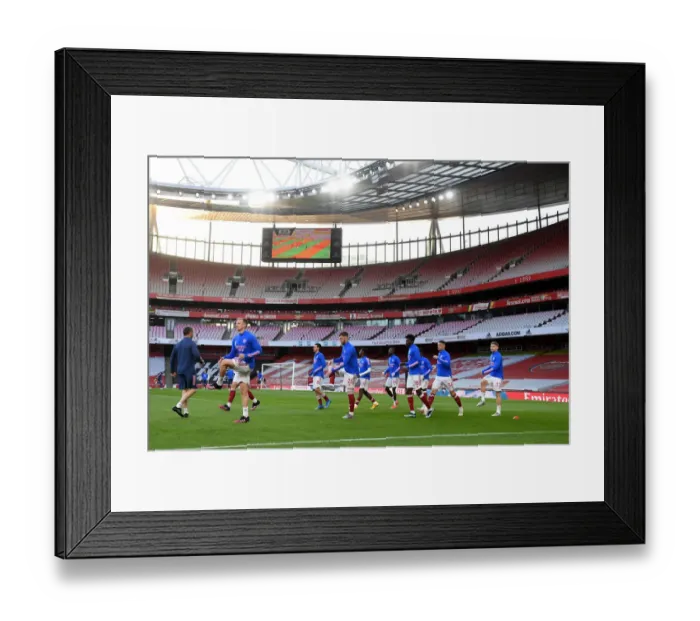 Framed Print : Arsenal vs. Everton: Premier League Battle at Emirates Stadium - The Gunners Prepare for Showdown