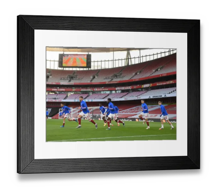Framed Print : Arsenal vs. Everton: Premier League Showdown - Arsenal Players Warm Up at Emirates Stadium