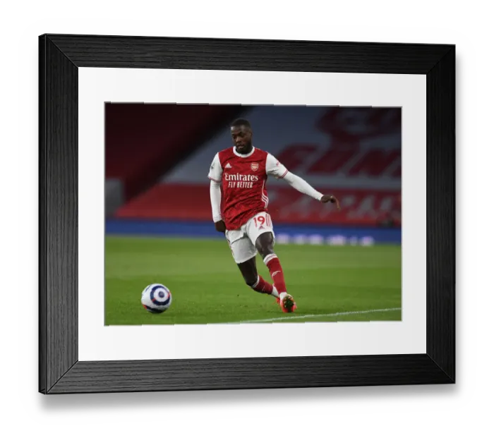 Framed Print : Arsenal's Nicolas Pepe in Action against Everton - Premier League 2020-21