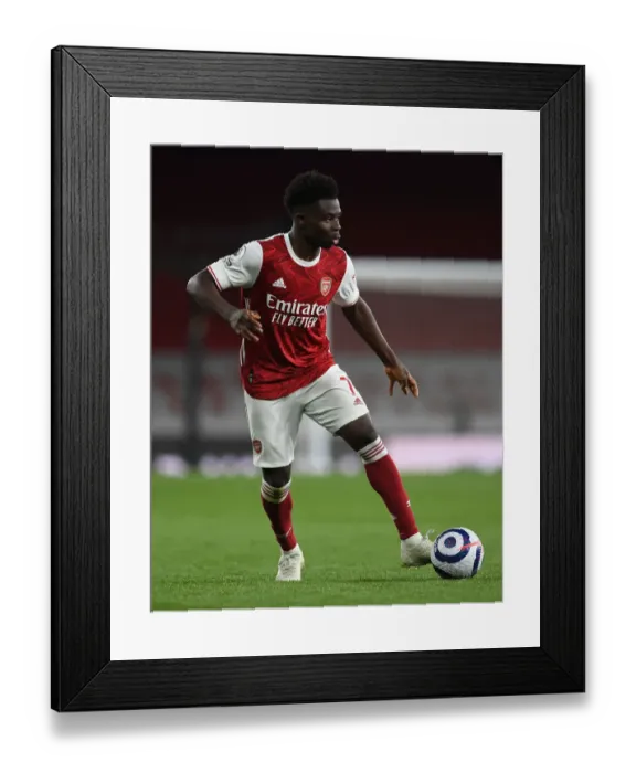 Framed Print : Arsenal's Bukayo Saka in Action against Everton during the 2020-21 Premier League Match Framed Print : Arsenal's Bukayo Saka in Action against Everton during the 2020-21 Premier League Match