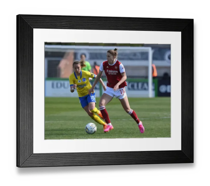 Framed Print : Battle of the Stars: Miedema vs. Green in Empty Arsenal Stadium