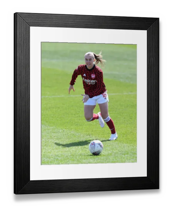 Framed Print : Arsenal Women Prepare for Brighton Match Amidst Empty Stands (2020-21)