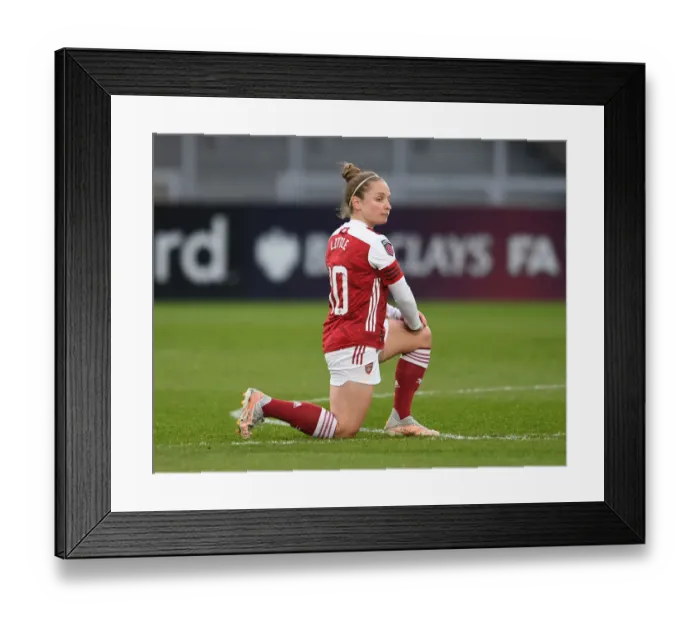 Framed Print : Arsenal's Kim Little Kneels in Empty Meadow Park: Arsenal Women vs West Ham United Women, FA WSL 2021