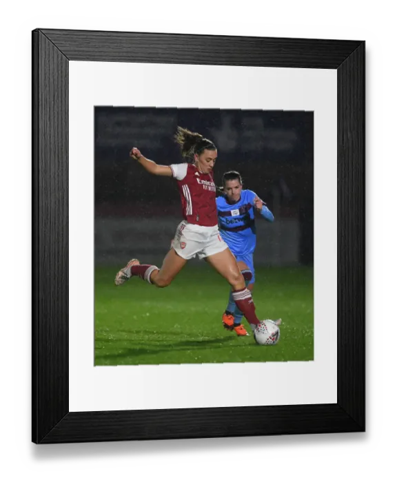 Framed Print : Arsenal's Katie McCabe Fights for Possession in Empty FA WSL Stadium: Arsenal Women vs. West Ham United Women (2021) Framed Print : Arsenal's Katie McCabe Fights for Possession in Empty FA WSL Stadium: Arsenal Women vs. West Ham United Women (2021)