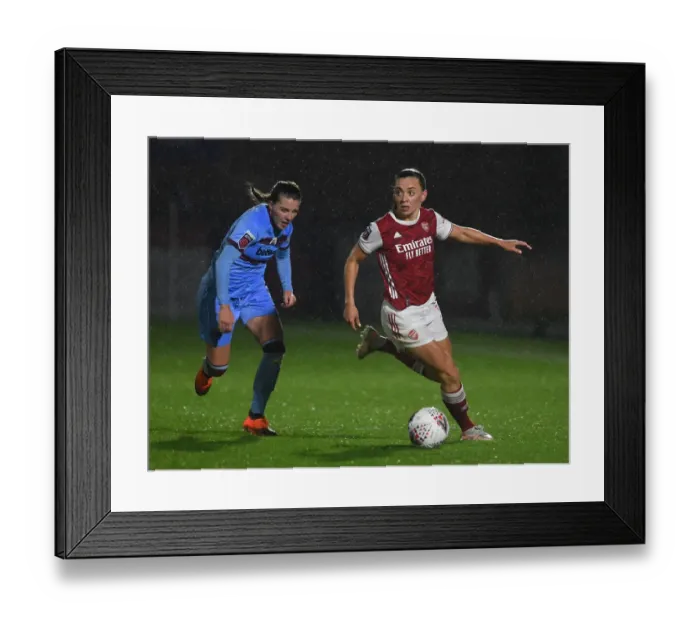 Framed Print : Arsenal's Katie McCabe Fights for Possession in Empty FA WSL Stadium Against West Ham United Women (2021)