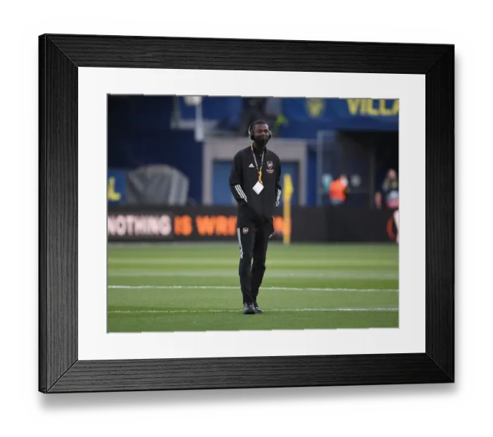 Framed Print : Arsenal's Nicolas Pepe Gears Up for UEFA Europa League Semi-Final Against Villarreal in Empty Estadio de la Ceramica