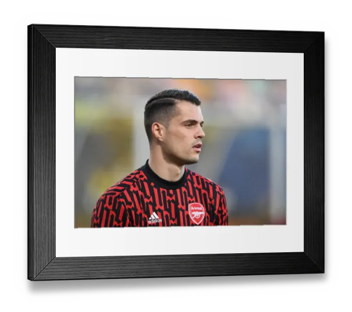 Framed Print : Granit Xhaka at Empty Estadio de la Ceramica: Arsenal's Europa League Semi-Final Battle in Villarreal Amid COVID-19 Restrictions Framed Print : Granit Xhaka at Empty Estadio de la Ceramica: Arsenal's Europa League Semi-Final Battle in Villarreal Amid COVID-19 Restrictions