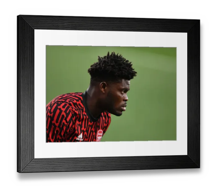 Framed Print : Thomas Partey Prepares for Arsenal's Europa League Semi-Final Clash against Villarreal in Empty Estadio de la Ceramica