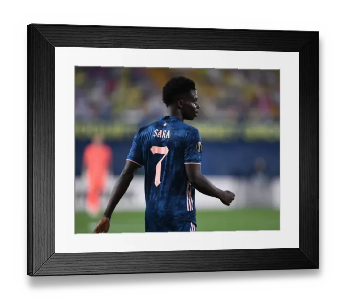 Framed Print : Bukayo Saka in UEFA Europa League Semi-Final: Villarreal Showdown Amidst Empty Stands Framed Print : Bukayo Saka in UEFA Europa League Semi-Final: Villarreal Showdown Amidst Empty Stands