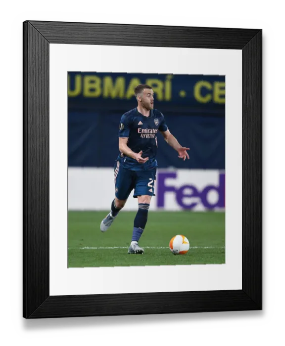 Framed Print : Arsenal's Calum Chambers at Villarreal's Empty Estadio de la Ceramica in UEFA Europa League Semi-Final