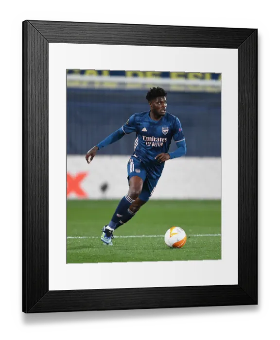 Framed Print : Thomas Partey in Action: Arsenal's Europa League Semi-Final Showdown with Villarreal (Behind Closed Doors)