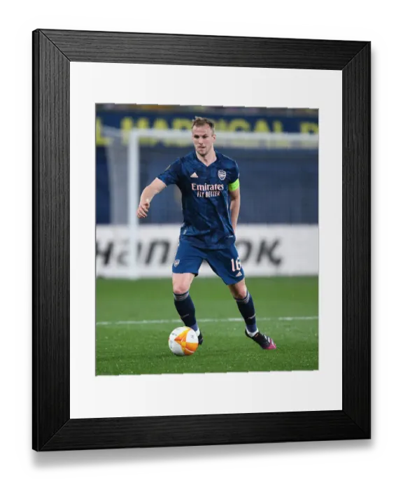 Framed Print : Arsenal's Rob Holding in UEFA Europa League Semi-Final Action against Villarreal in Spain (Behind Closed Doors) Framed Print : Arsenal's Rob Holding in UEFA Europa League Semi-Final Action against Villarreal in Spain (Behind Closed Doors)