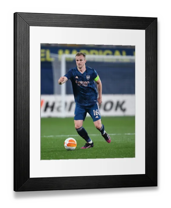 Framed Print : Empty Europa League Semi-Final: Rob Holding Faces Villarreal in Silent Stadium