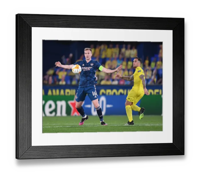 Framed Print : Arsenal's Rob Holding Clashes with Paco Alcacer in UEFA Europa League Semi-Final Against Villarreal