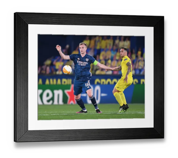 Framed Print : Rrob Holding vs Paco Alcacer: A Battle in the UEFA Europa League Semi-Finals Framed Print : Rrob Holding vs Paco Alcacer: A Battle in the UEFA Europa League Semi-Finals