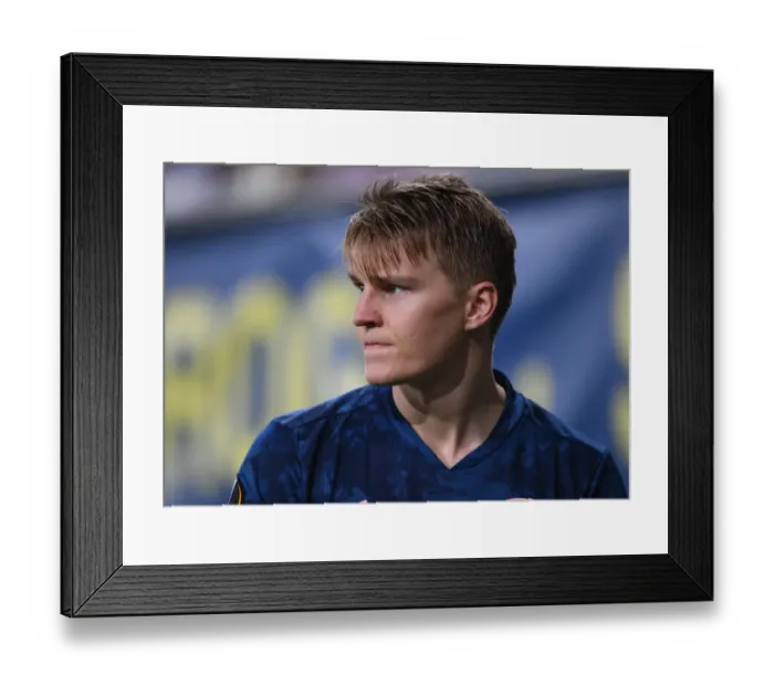 Framed Print : Martin Odegaard in Action: Arsenal's Europa League Semi-Final Battle against Villarreal (2021) Framed Print : Martin Odegaard in Action: Arsenal's Europa League Semi-Final Battle against Villarreal (2021)