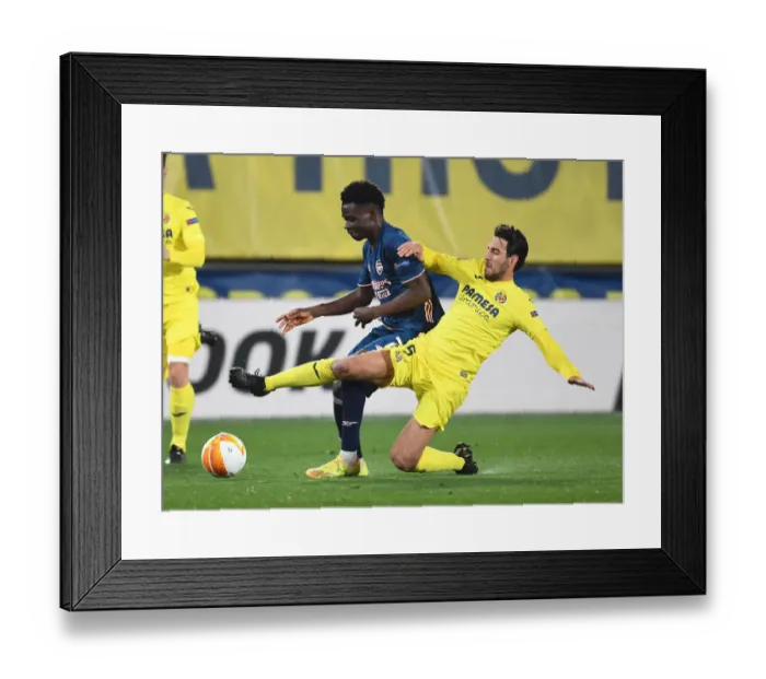 Framed Print : Bukayo Saka vs Dani Parejo: A Europa League Semi-Final Battle at Villarreal's Estadio de la Ceramica Framed Print : Bukayo Saka vs Dani Parejo: A Europa League Semi-Final Battle at Villarreal's Estadio de la Ceramica