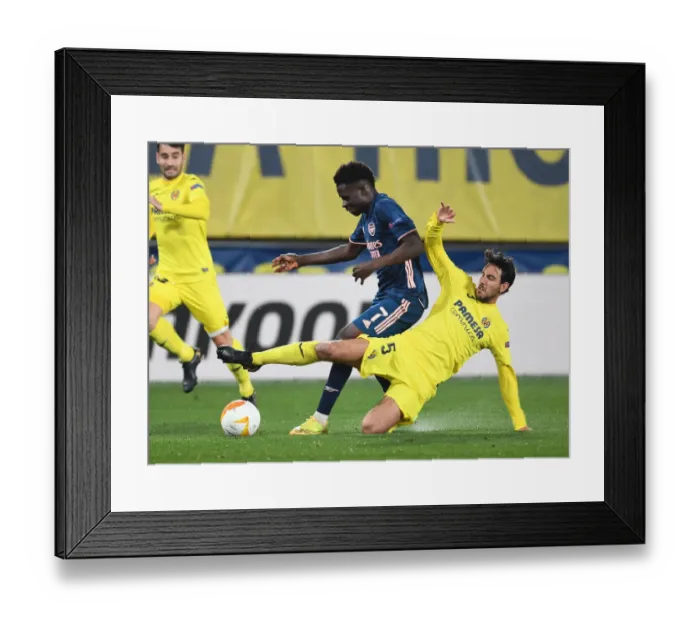 Framed Print : Saka vs Parejo: A Europa League Semi-Final Showdown at Villarreal Framed Print : Saka vs Parejo: A Europa League Semi-Final Showdown at Villarreal